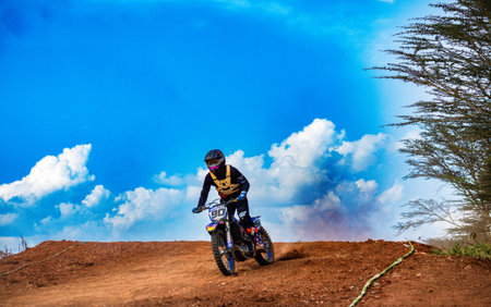 Unidentified rider participates in competition Motocross Thailand Championship 2014 in Chiang Mai,...