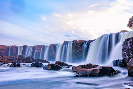 Beautiful waterfalls in the national park at sunset. Thailand.の写真素材