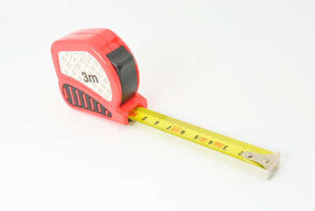 red plastic roulette with yellow scale and white textureの写真素材