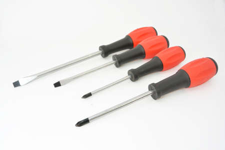 some screwdrivers with red black handle and white textureの写真素材