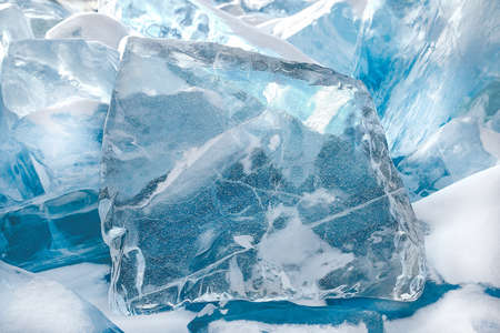 Beautiful transparent blue ice blocks, winter background, close-up viewの写真素材