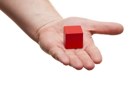 block in the hands of on white backgroundの写真素材