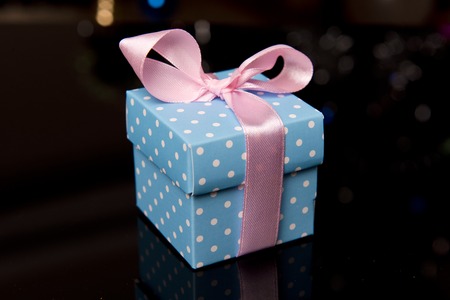 blue gift with pink ribbonの写真素材