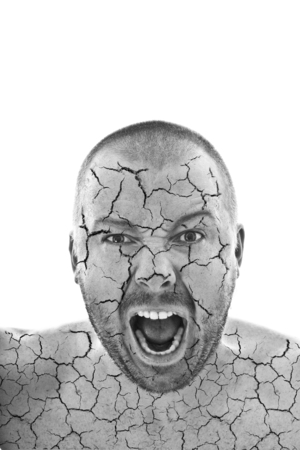 black and white portrait of an angry man on white backgroundの写真素材