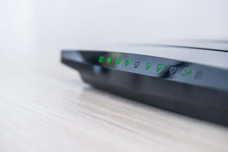 black, shiny router on white backgroundの写真素材