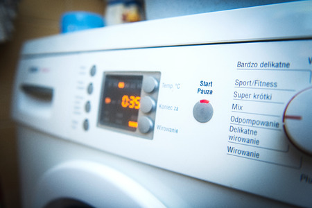 close-up on the display white washing machineの写真素材