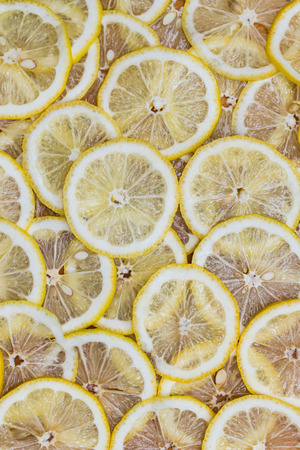 background made with slices of lemonの写真素材