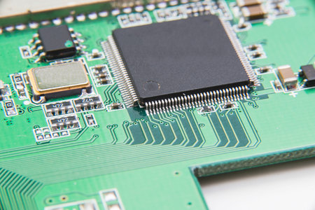 Electronic circuit board close up. Green PCB