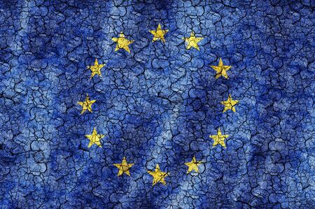 european union flag on a cracked backgroundの写真素材