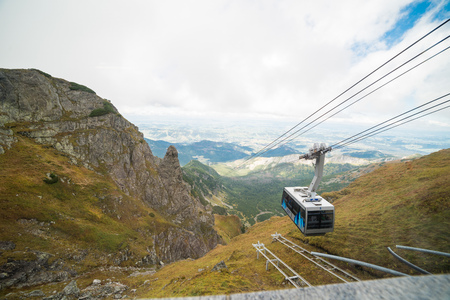 KUZNICE, POLAND-SEPTEMBER 18: Cable car carries passengers from Kuznice to Kasprowy Wierch peak on Septomer 18, 2017 in Zakopane, Poland. This cable car built in 1936, was the first of its kind in Polandのeditorial素材
