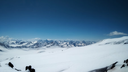Beautiful snow covered mountain range against sky