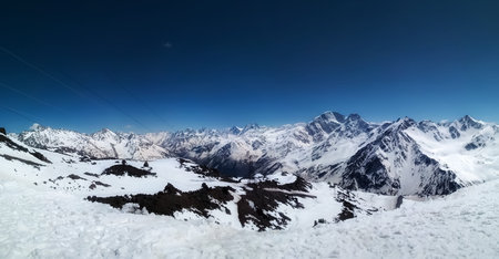 Beautiful snow covered mountain range against sky
