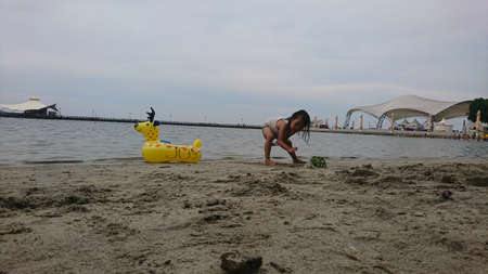 Children playing in beach before pendemic coronaのeditorial素材