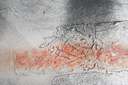 Close up of scratched metal surface with colored partsの写真素材