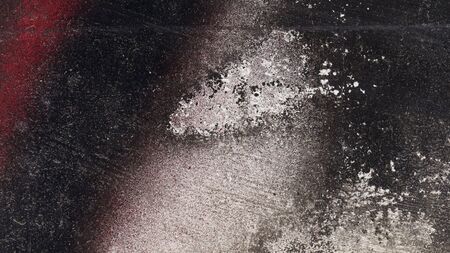 Old dirty rough painted metal surface   16:9Close up,macro photography of cracked,peeled red,white and black paint on grungy metal fenceAbstract,textured,colourful background with space for copy,textの写真素材