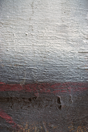 Aged paint  on old rough dirty metal surface. Abstract  grunge texture background with different colors : brown, red, white.
Close up, macro photo with space for copy text 3の写真素材
