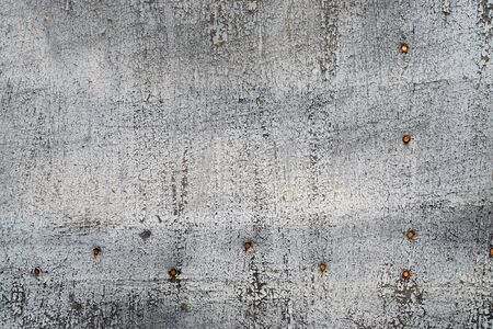 Part of cracked  peeled  dirty  ragged wall
Close up of grunge, aged, weathered,  vintage surface
Abstract textured backgroundの写真素材