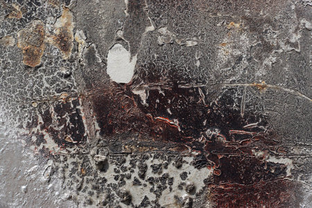 Abstract textured background. Grunge metal close up.Rusty, dirty old metal sprinkled with brown,...