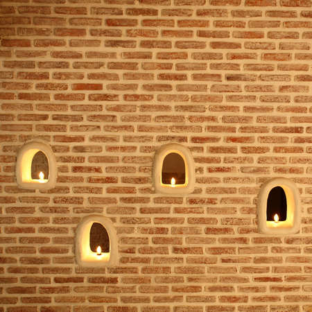 Brick walls and candle lightの写真素材