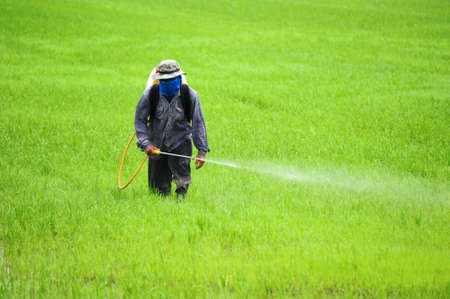 Farmer spraying pesticideの写真素材