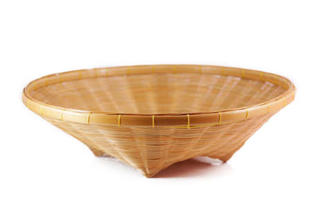 bamboo basket isolated on whiteの写真素材