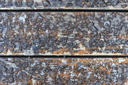 Melting snow on wooden floorの写真素材