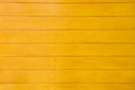 Yellow wooden wallの写真素材