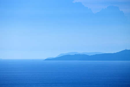 mountains and sea, looking from Pattaya beach Thailand.の写真素材