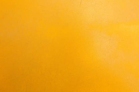 cracked peeling yellow paint texture layerの写真素材