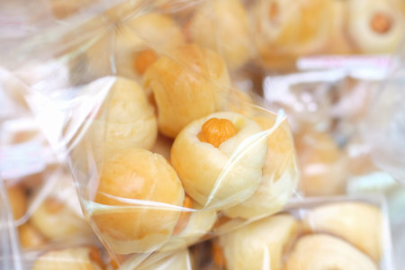 bread with sausage in plastic bag
