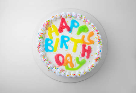 birthday cake isolated on whiteの写真素材