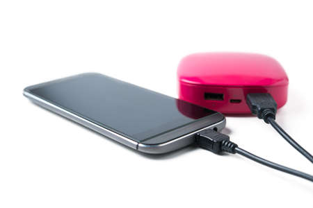 Smart phone charging with power bankの写真素材