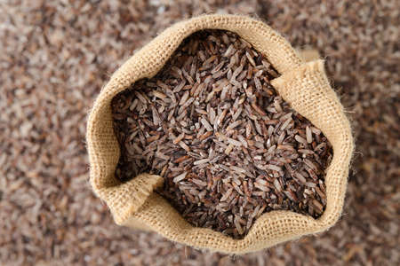 brown rice in sack bagの写真素材