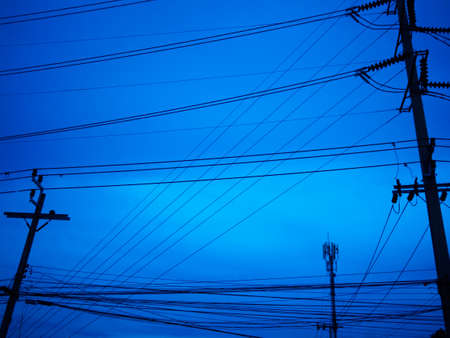 electricity cable at evening skyの写真素材