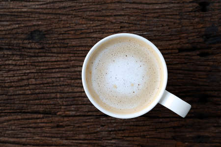 cappuccino on a wooden tableの写真素材
