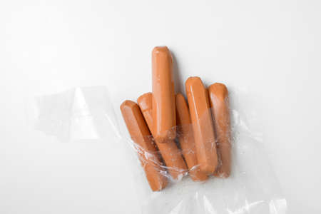open bag of sausageの写真素材