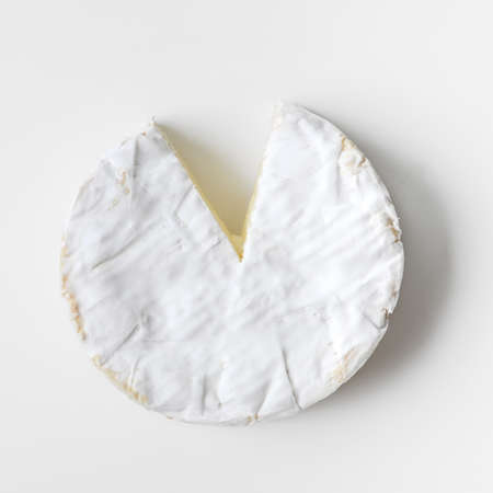 camembert cheese isolated on whiteの写真素材