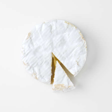 slice camembert cheese isolated on whiteの写真素材