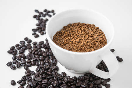 instant coffee in cup with coffe beanの写真素材