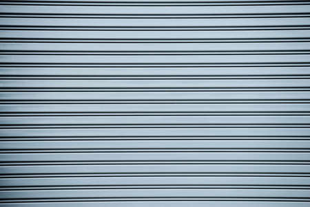gray roller metal door backgroundの写真素材
