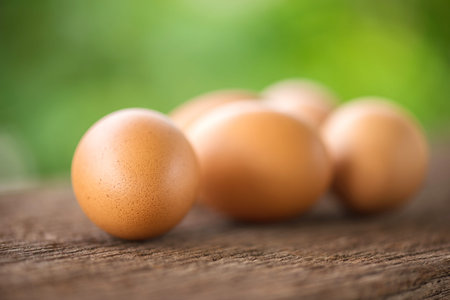 eggs on a wooden and nature background