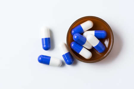 pills capsules isolated on white backgroundの写真素材