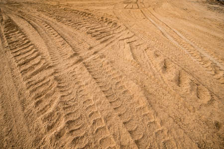 wheel track on the sandの写真素材