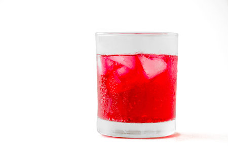 red soft drinks in a glass with clipping path