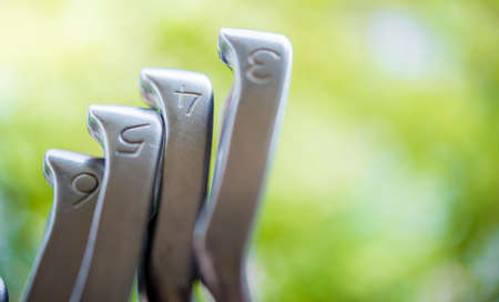 golf clubs in golf courseの写真素材