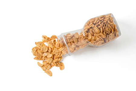 fried garlic in plastic bottleの写真素材