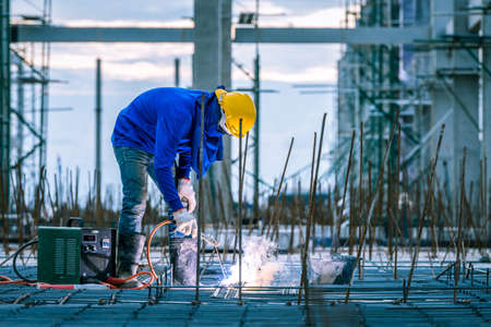 welder welding worker in the construction siteの写真素材
