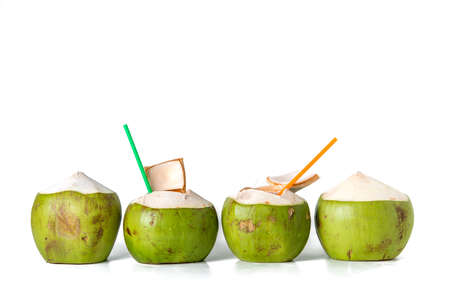 row of fresh coconut on white backgroundの写真素材