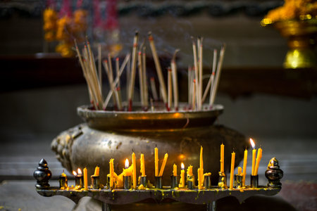 Light candle burning for worship the buddha in the temple