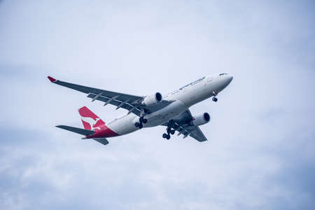 Bangkok, Thailand - May 4, 2018: Qantas airbus approaches runway for a landing at Suvarnabhumi International Airport, Bangkok, Thailand.のeditorial素材